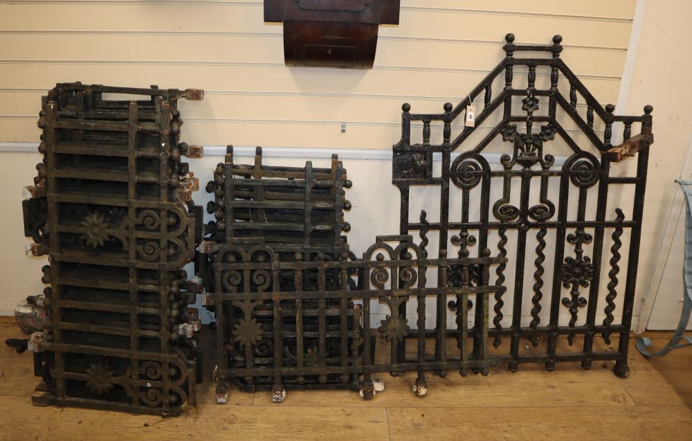 A Victorian cast iron gate, W.93cm H.120cm and approximately 12m of railings